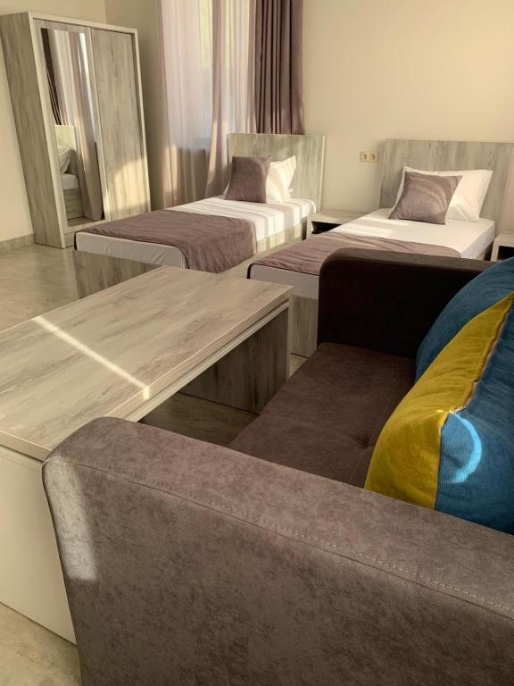 Postel nebo postele na pokoji v ubytování Hotel Menua