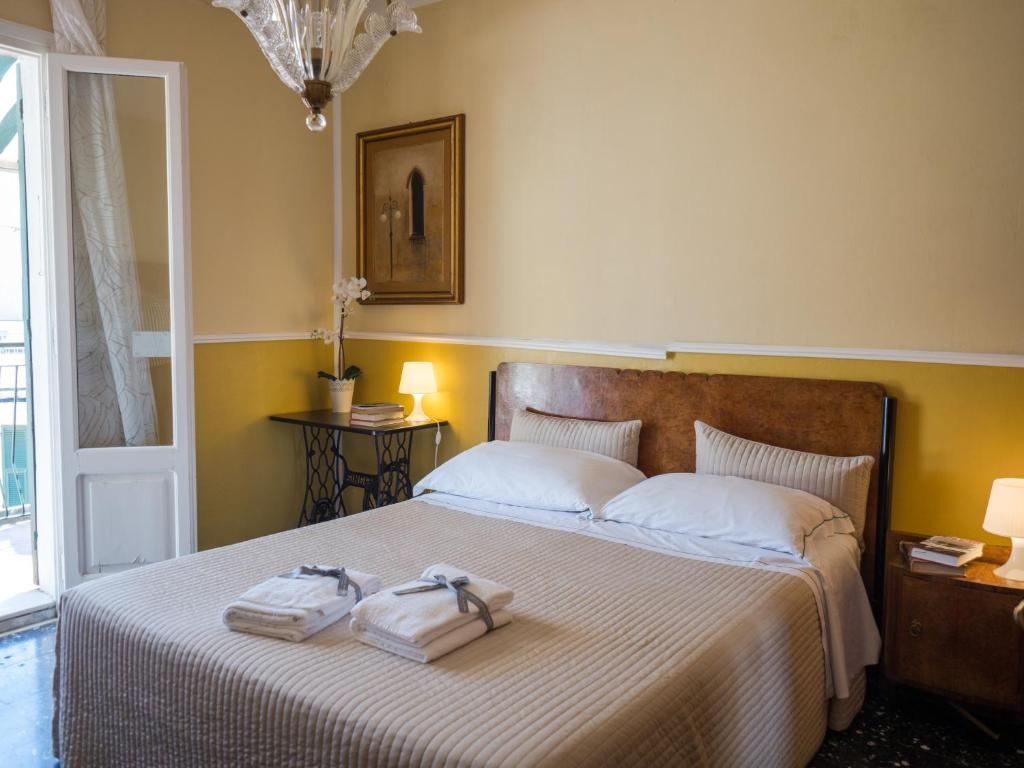 Postel nebo postele na pokoji v ubytování Recanissu Apartment with balcony & AC