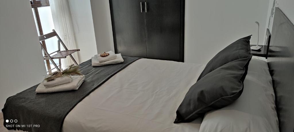Postel nebo postele na pokoji v ubytování El Enclave