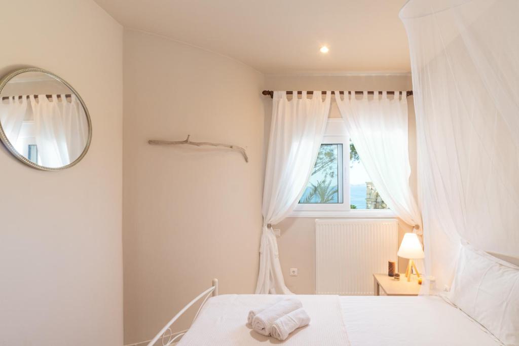 Łóżko lub łóżka w pokoju w obiekcie Liogerma Resorts