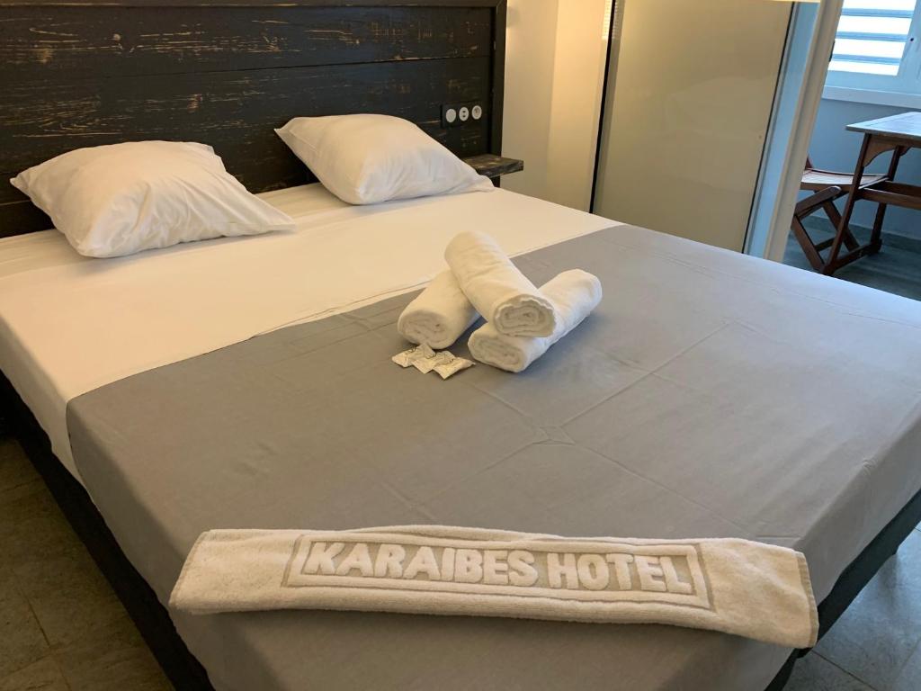 Postel nebo postele na pokoji v ubytování Karaibes Residence