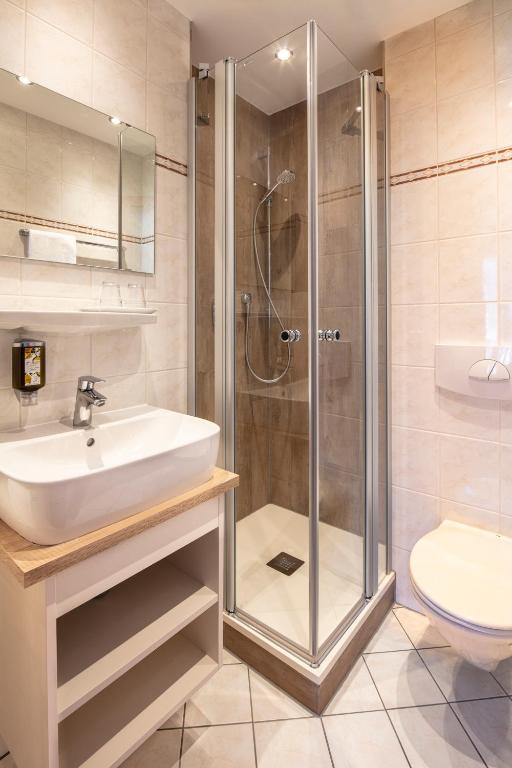 Koupelna v ubytování Hotel Centgraf