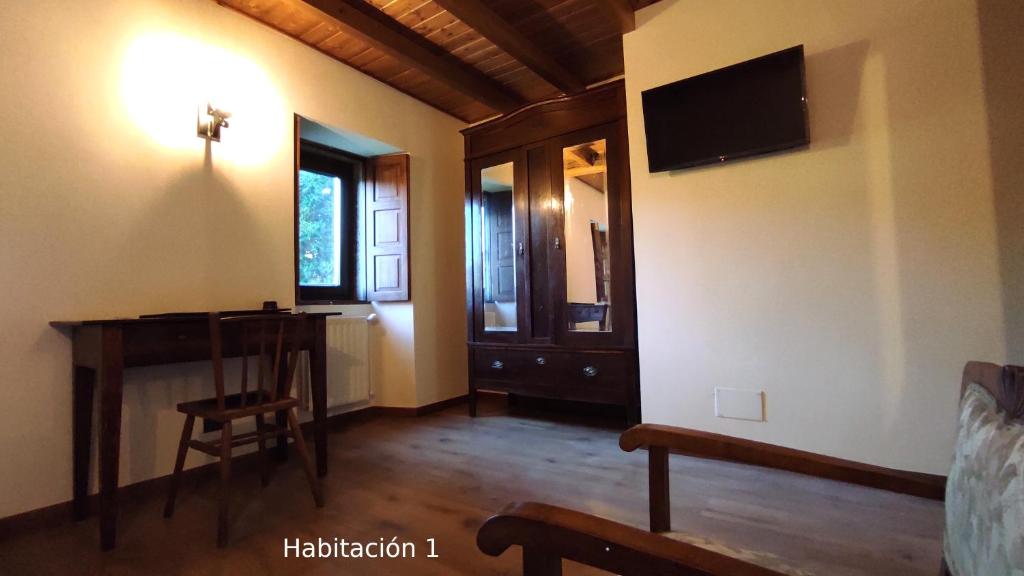 TV a/nebo společenská místnost v ubytování Casa do Médico