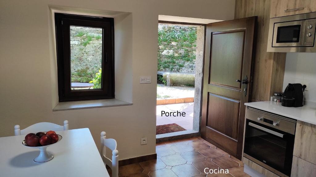 Kuchyň nebo kuchyňský kout v ubytování Casa do Médico