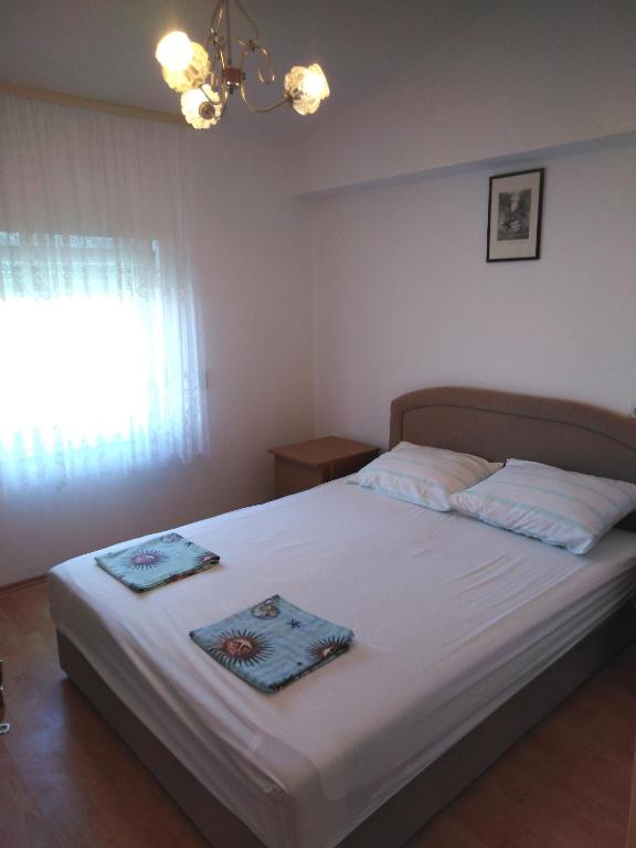 Posteľ alebo postele v izbe v ubytovaní Apartman Ivica