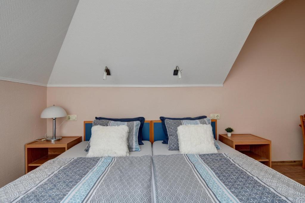 Posteľ alebo postele v izbe v ubytovaní Apartman Villa Magdalena