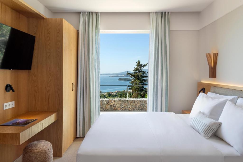 Postel nebo postele na pokoji v ubytování Greenstone Villas