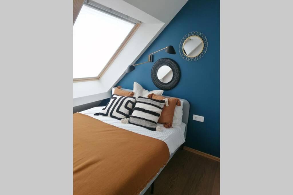 Katil atau katil-katil dalam bilik di GREEN HILL apartment with a view to Lagoon