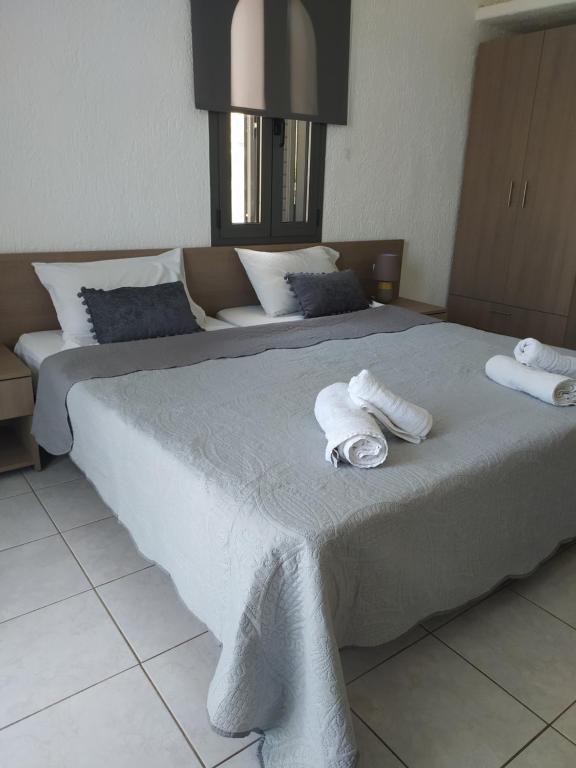 Postel nebo postele na pokoji v ubytování Lena Apartments