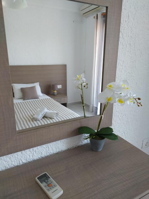 Postel nebo postele na pokoji v ubytování Lena Apartments