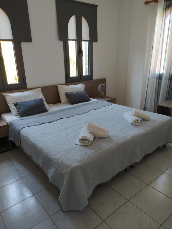 Postel nebo postele na pokoji v ubytování Lena Apartments