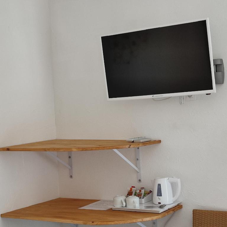 TV a/nebo společenská místnost v ubytování Le monte rosso