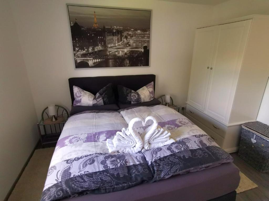 Postel nebo postele na pokoji v ubytování Ferienwohnung Zwei Seen