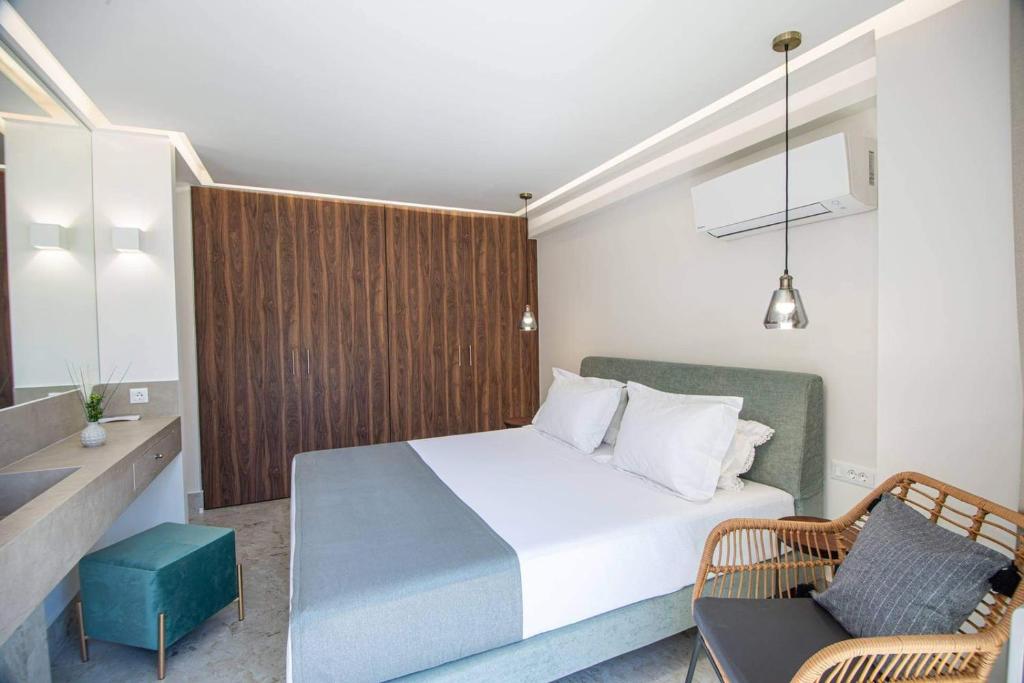 Кровать или кровати в номере Nama Sea Side Suites