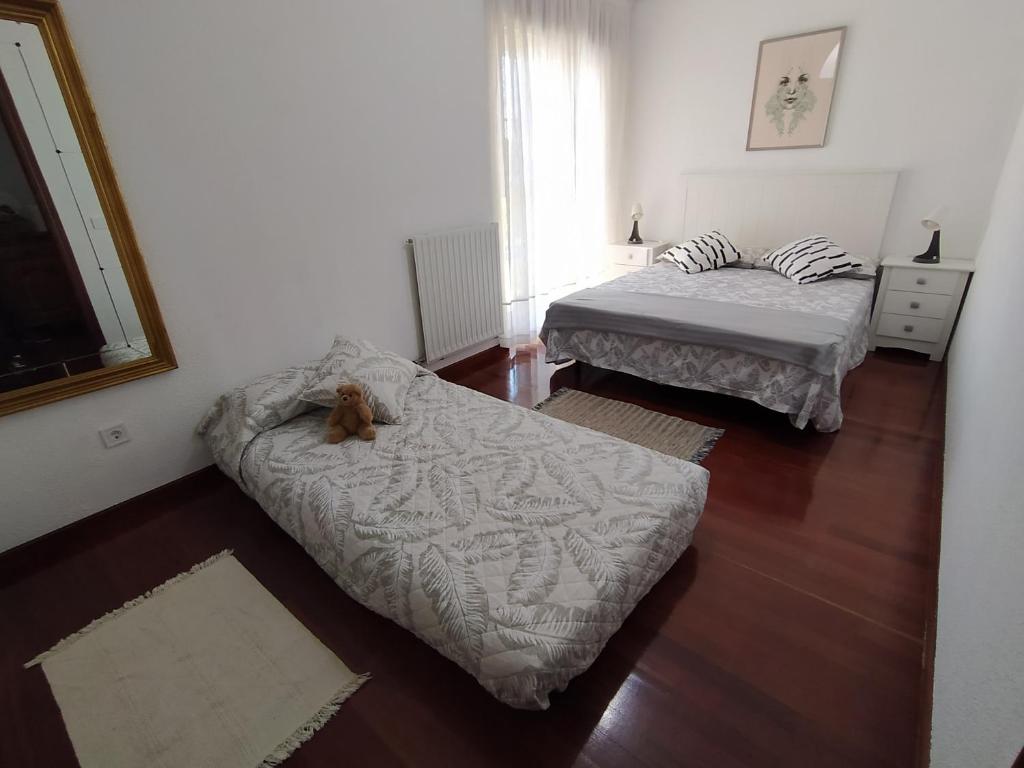 Postel nebo postele na pokoji v ubytování Duplex de 130m2 al lado de las playas de Cuchia