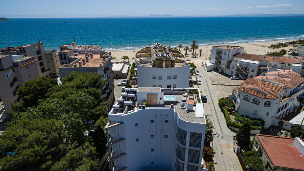 an aerial view of a city and the beach at Vista Roses Mar - Vent De Mar in Roses