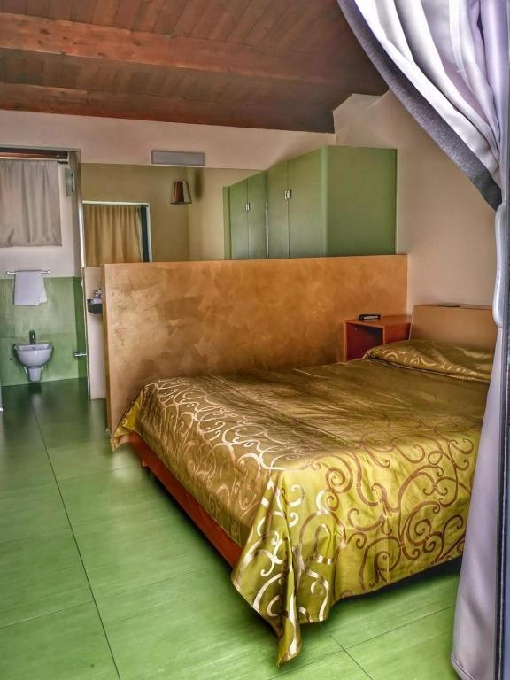 Postel nebo postele na pokoji v ubytování Ciacco Hotel