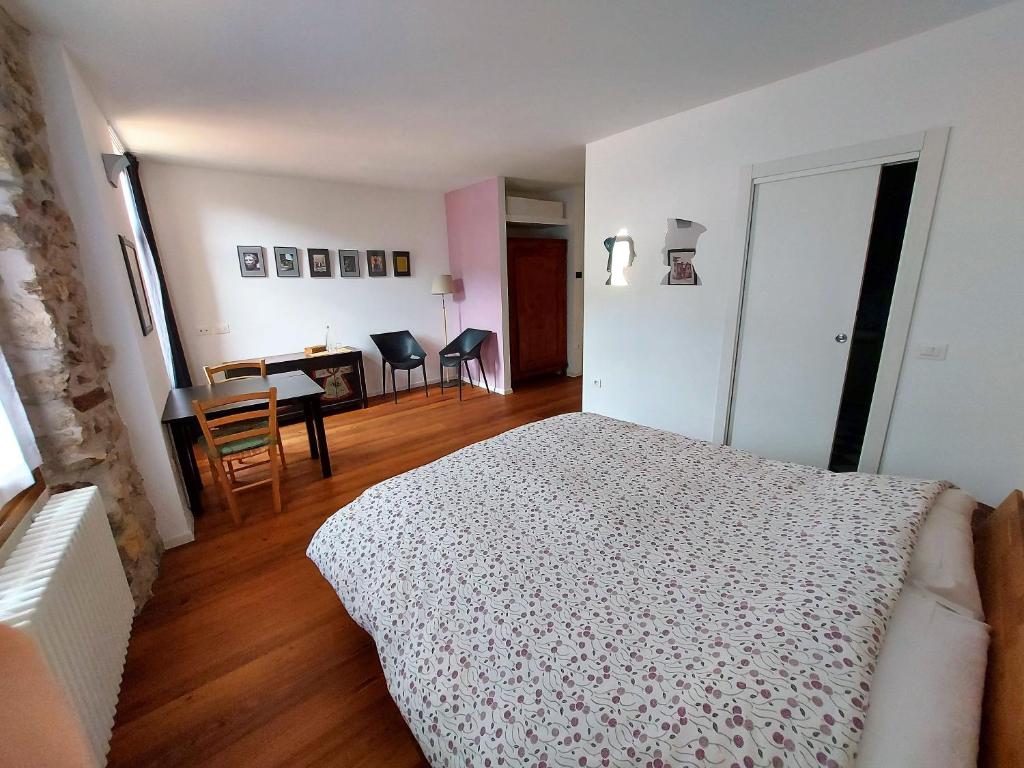 Postel nebo postele na pokoji v ubytování La Piazzetta di Canale B&B