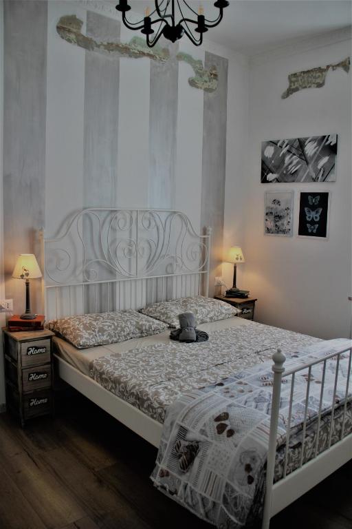 Postel nebo postele na pokoji v ubytování Rial Maison