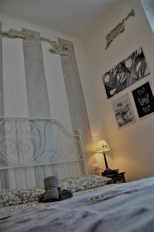 Postel nebo postele na pokoji v ubytování Rial Maison