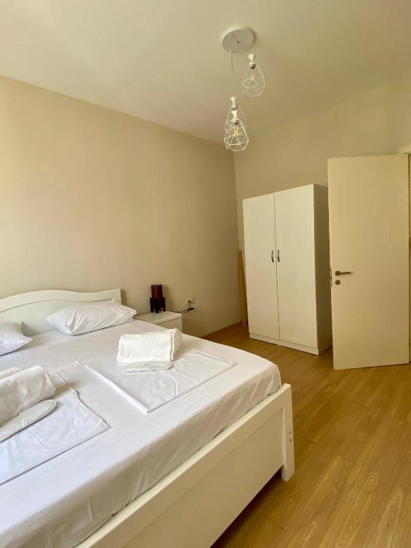 Postel nebo postele na pokoji v ubytování Liberty Apartment