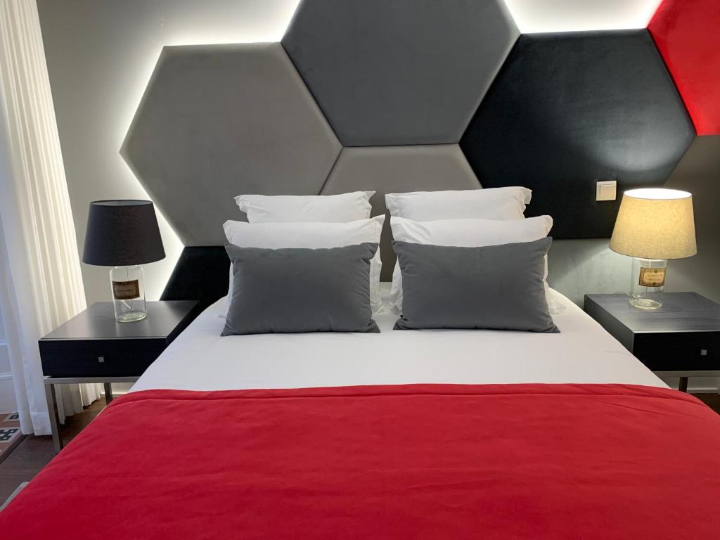 Postel nebo postele na pokoji v ubytování Pharmacia GuestHouse
