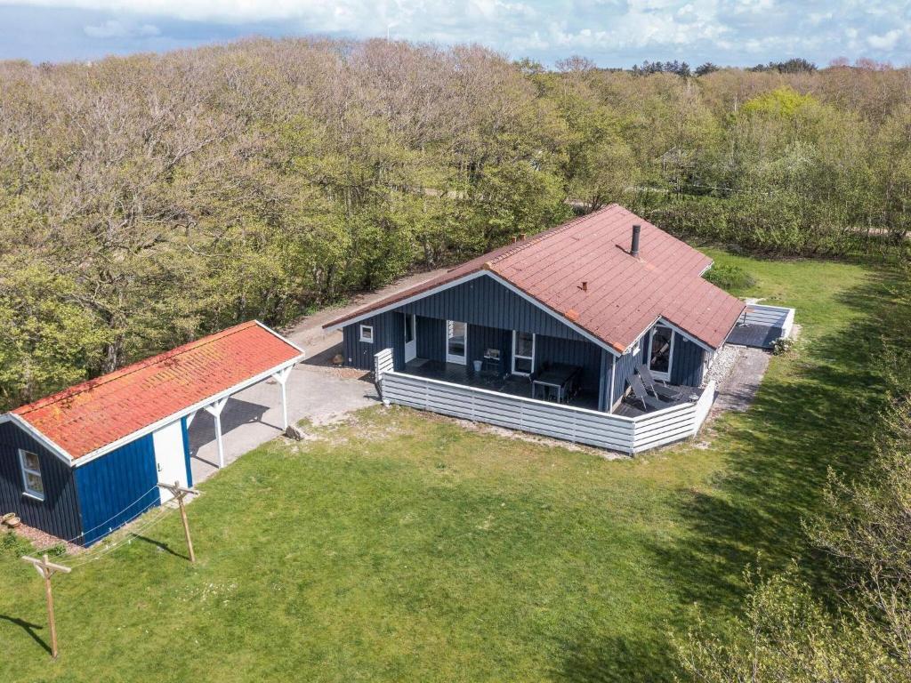 an overhead view of a house with a yard at 6 person holiday home in Fanø in Fanø