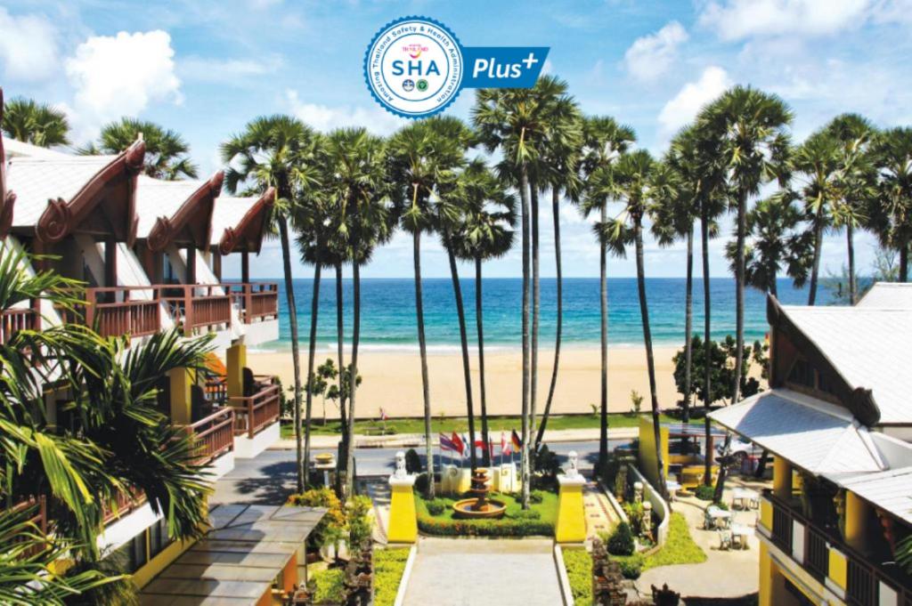 a view of the beach from the resort at Woraburi Phuket Resort & Spa - SHA Plus in Karon Beach