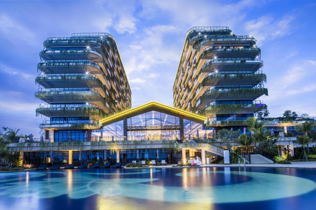 a rendering of a building with a pool at Forest City Golf Hotel in Nusajaya