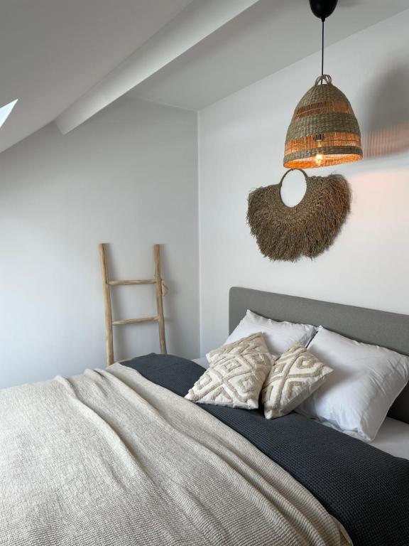 Postel nebo postele na pokoji v ubytování Dune Du Clémot
