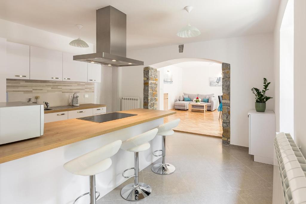 Kuchyň nebo kuchyňský kout v ubytování Apartma Sabina