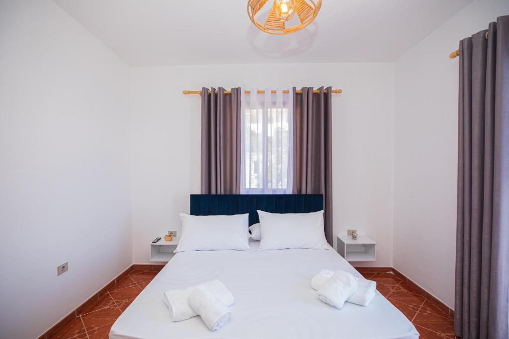 Postel nebo postele na pokoji v ubytování Villa Gaudium