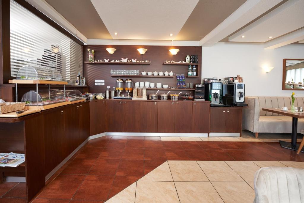 Příslušenství pro přípravu čaje a kávy v ubytování Hotel Meyerhof