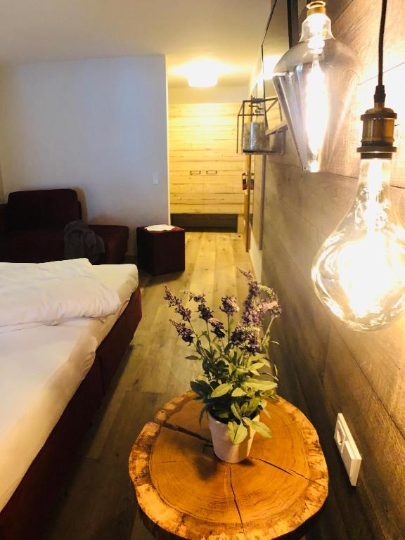 Postel nebo postele na pokoji v ubytování Hotel Alpenblick
