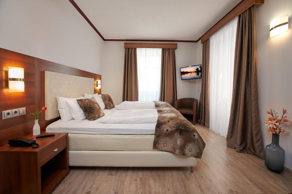 Postel nebo postele na pokoji v ubytování Hotel Meyerhof