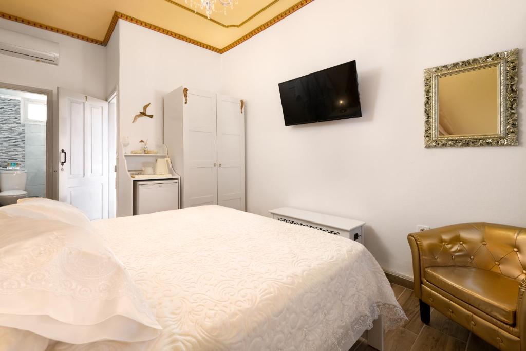 TV a/nebo společenská místnost v ubytování Marika's Deluxe Rooms