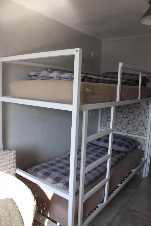 Postel nebo postele na pokoji v ubytování Stadtalm Naturfreundehaus