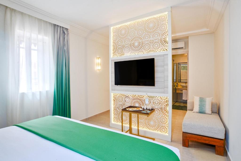 TV a/nebo společenská místnost v ubytování Sol Oasis Marrakech - All Inclusive
