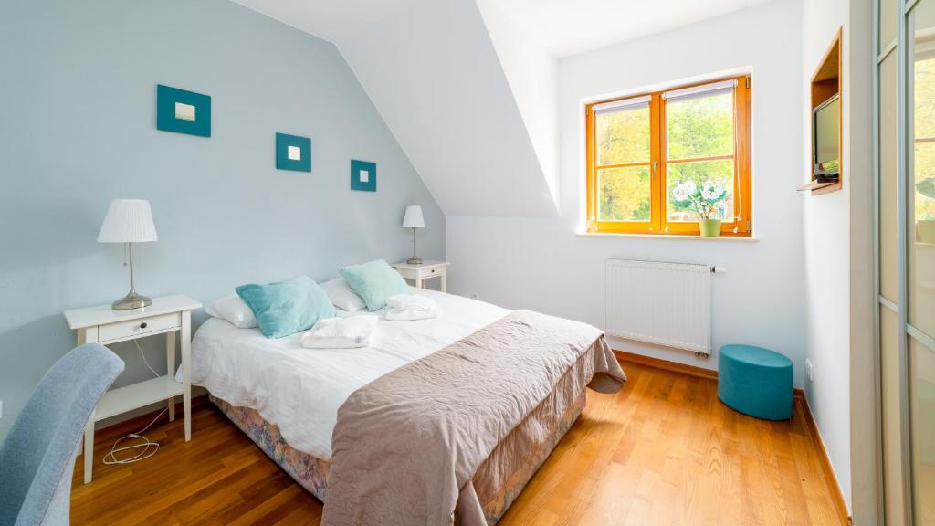 Posteľ alebo postele v izbe v ubytovaní Apartamenty Sun & Snow Karpacz Myśliwska