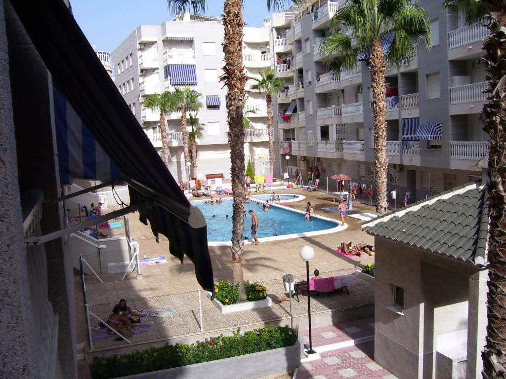 Hồ bơi trong/gần appartement de vacances dans résidence en ESPAGNE