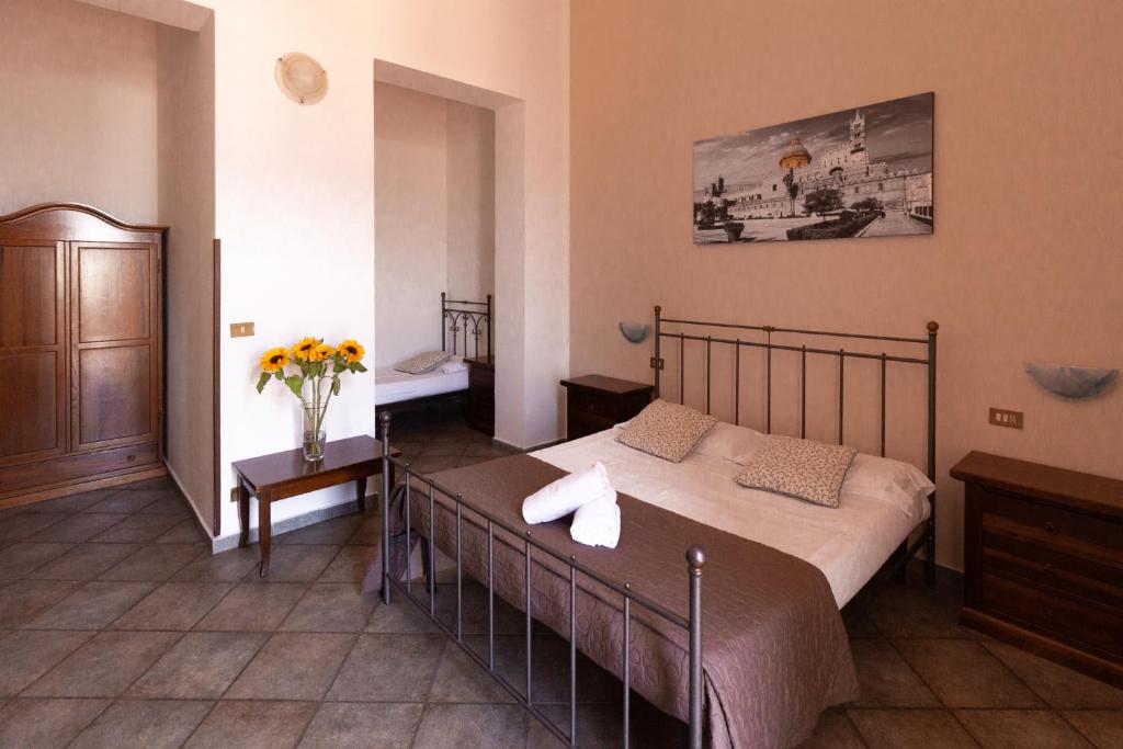 Posteľ alebo postele v izbe v ubytovaní Hotel Concordia