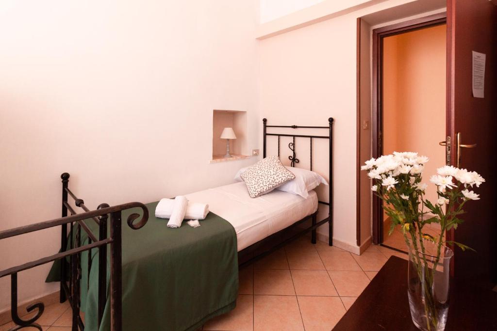 Posteľ alebo postele v izbe v ubytovaní Hotel Concordia