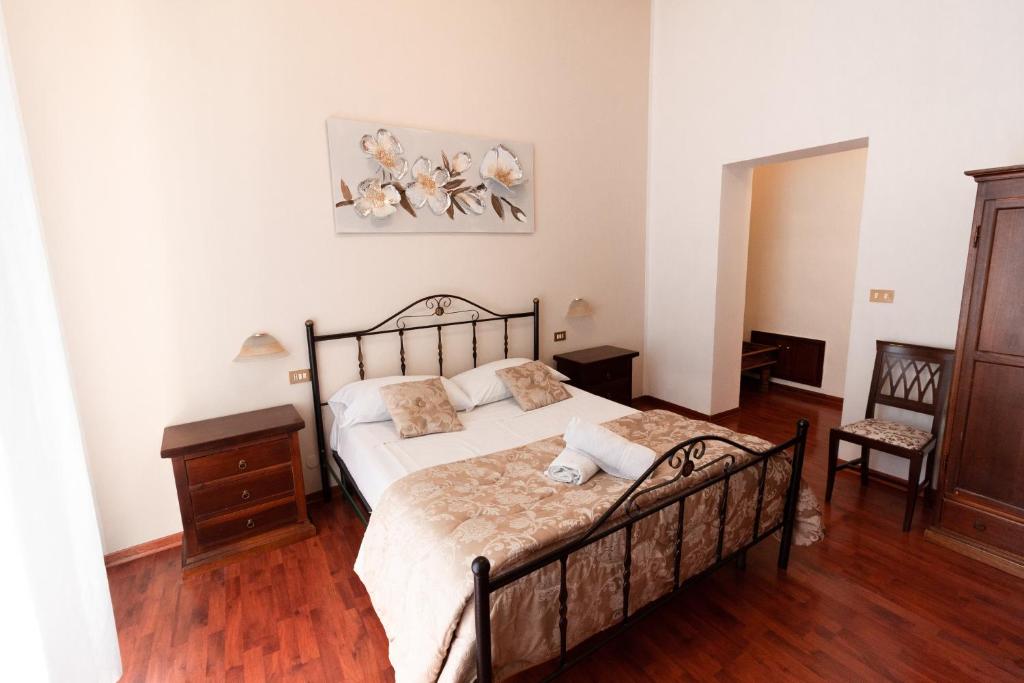 Posteľ alebo postele v izbe v ubytovaní Hotel Concordia