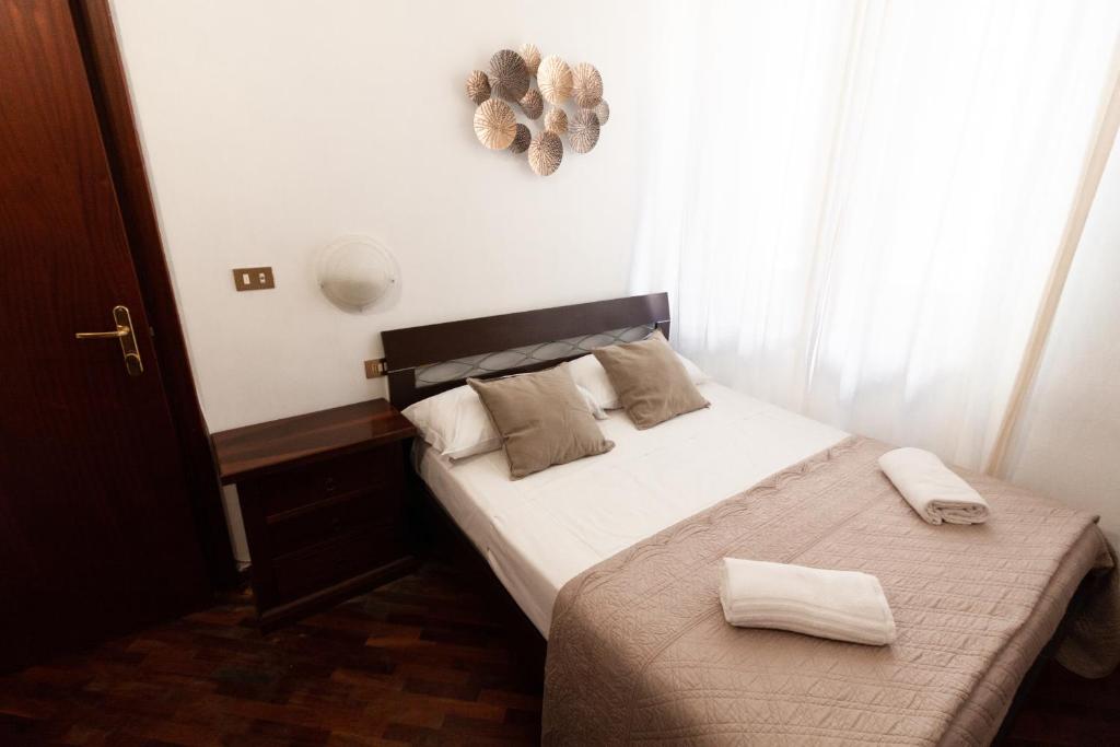 Posteľ alebo postele v izbe v ubytovaní Hotel Concordia