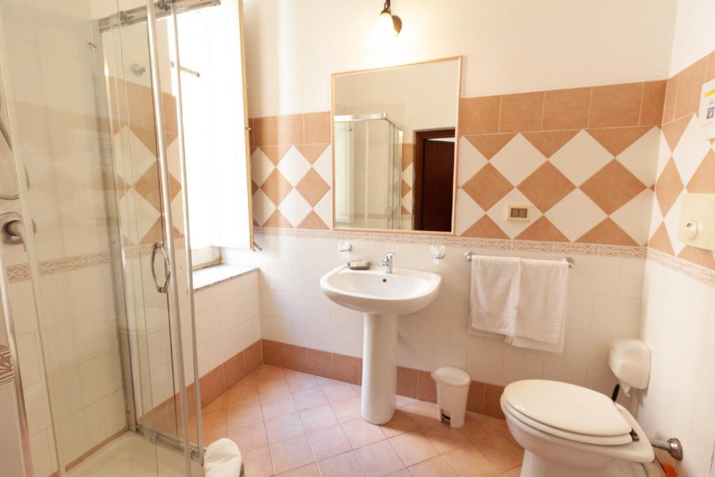 Kúpeľňa v ubytovaní Hotel Concordia