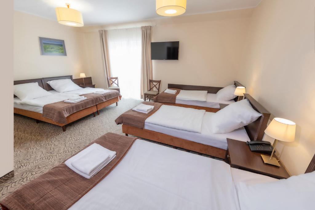 Posteľ alebo postele v izbe v ubytovaní Hotel Mona Lisa Wellness & Spa