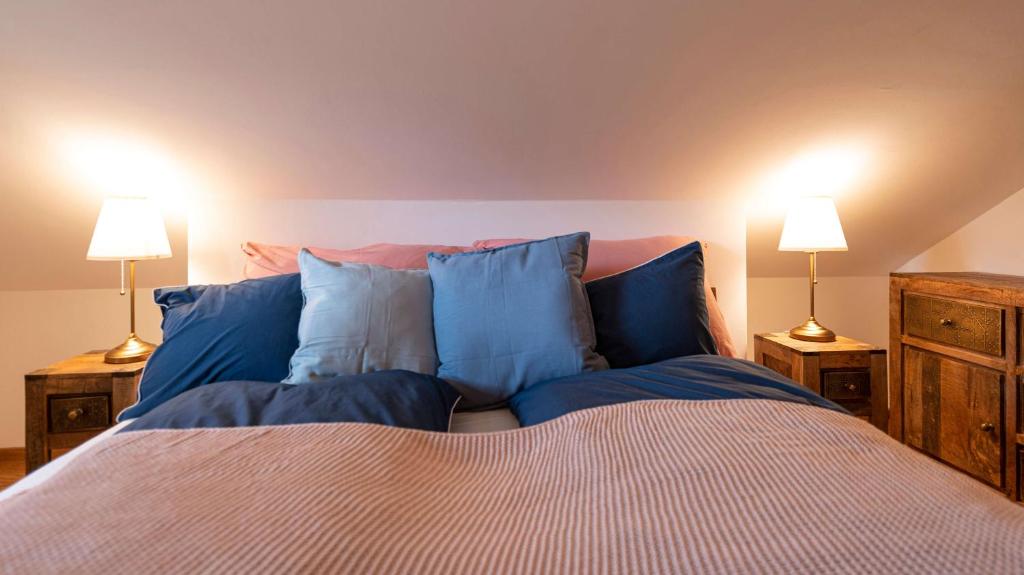 Postel nebo postele na pokoji v ubytování Ferienwohnung Flora Altaussee