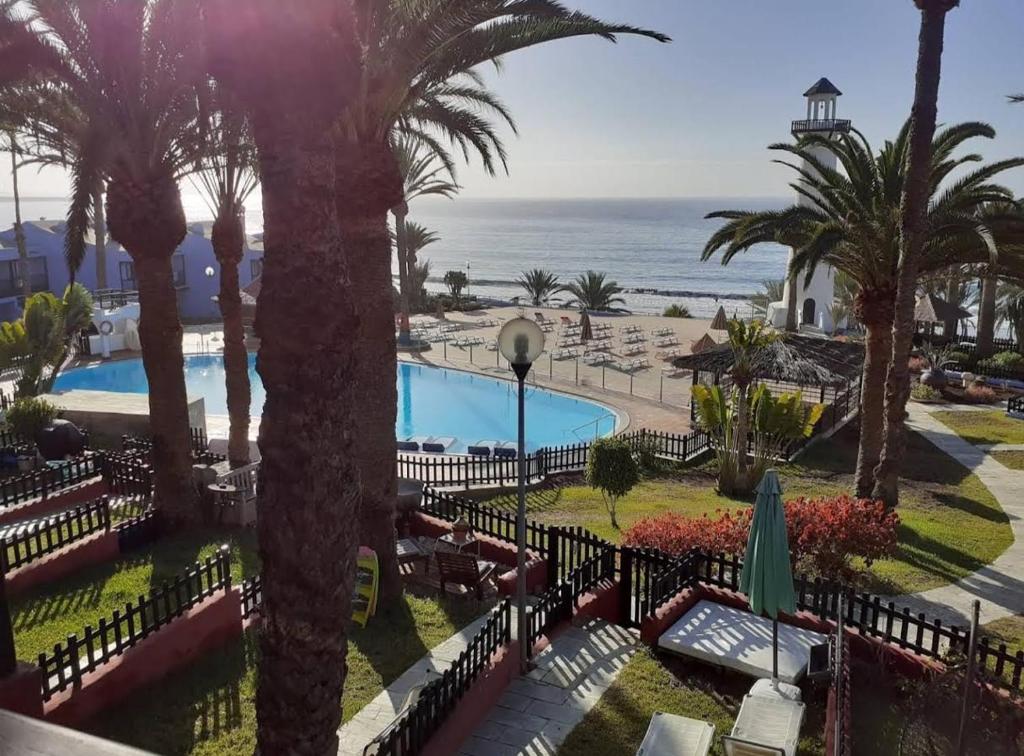 a view of the beach from the resort at Charming Bellagio SUN CLUB in San Bartolomé