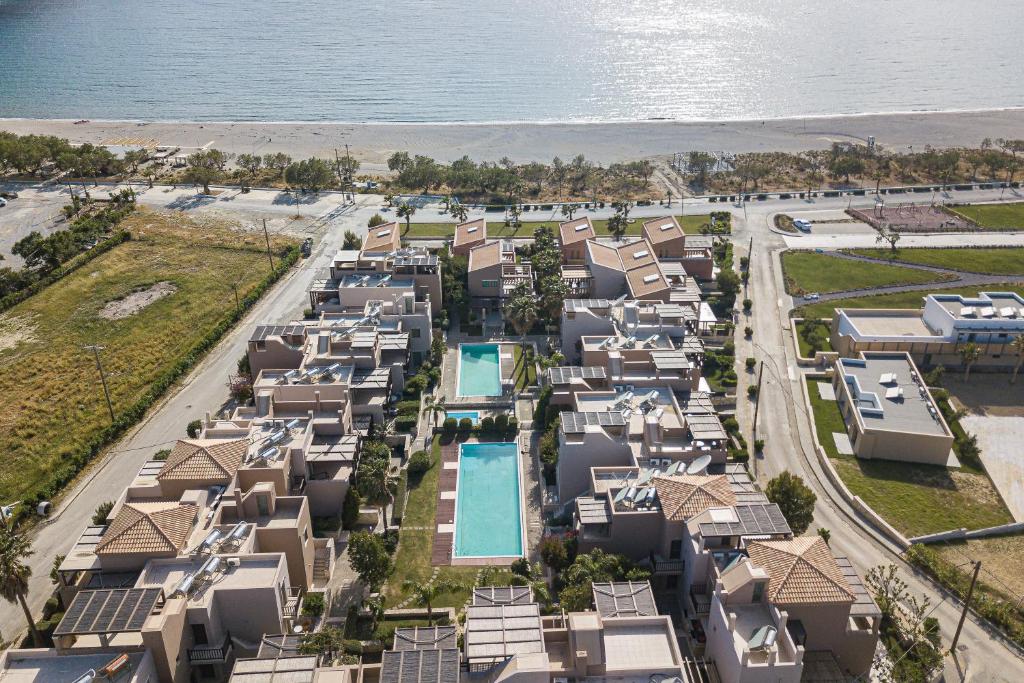 an aerial view of a resort near the beach at A & C Homes in Plakias