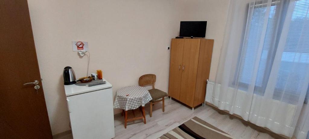 TV a/nebo společenská místnost v ubytování Guest House Kukera